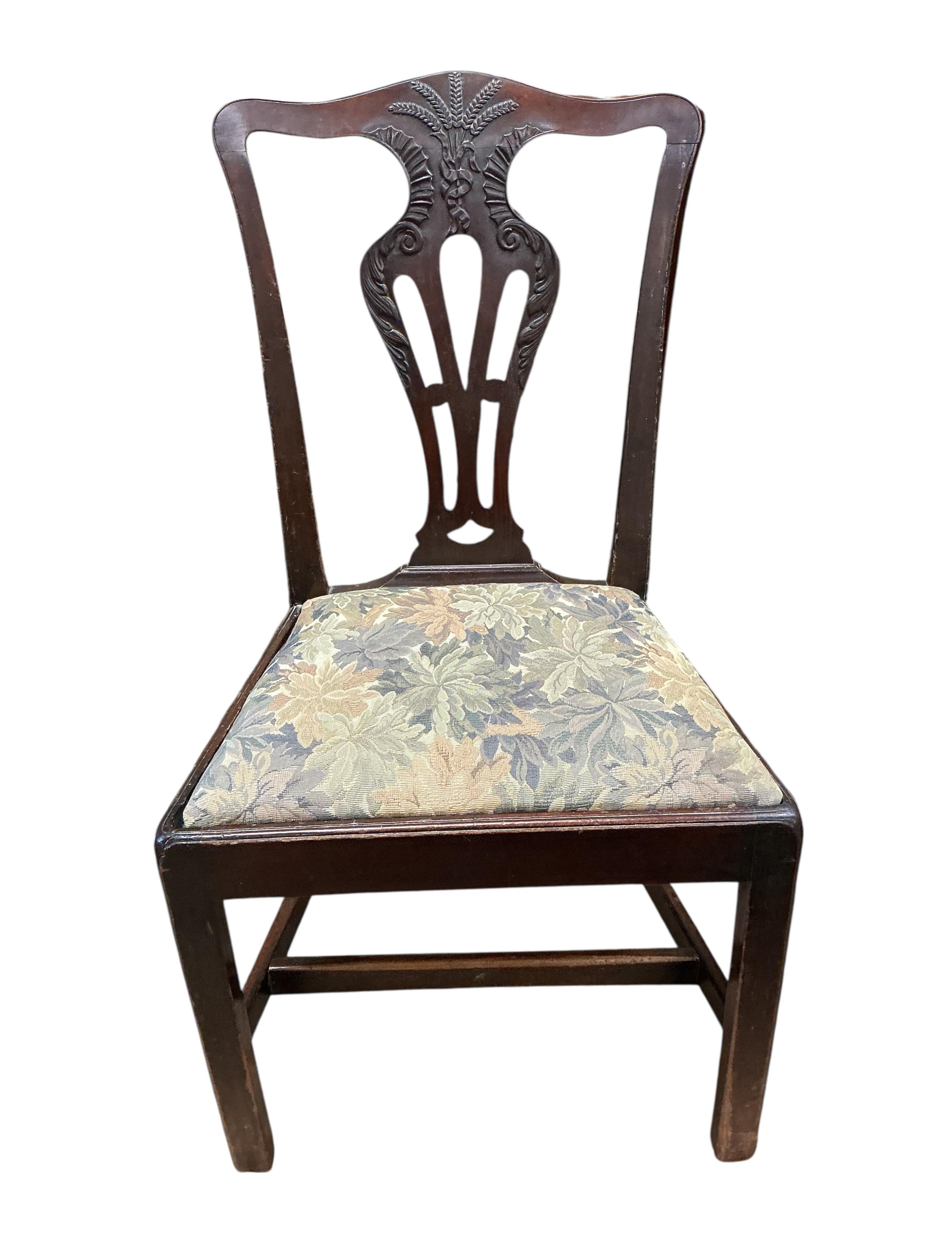 A set of six George III mahogany dining chairs